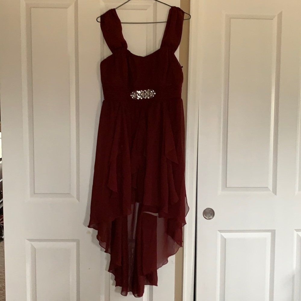 Wine colored high low dress with rhinestone detail.